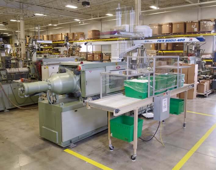 1260.jpg injection molding press in Rodon's facility