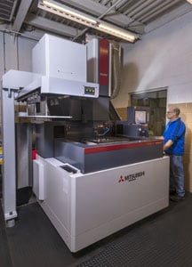 Rodon employee operates cnc machine